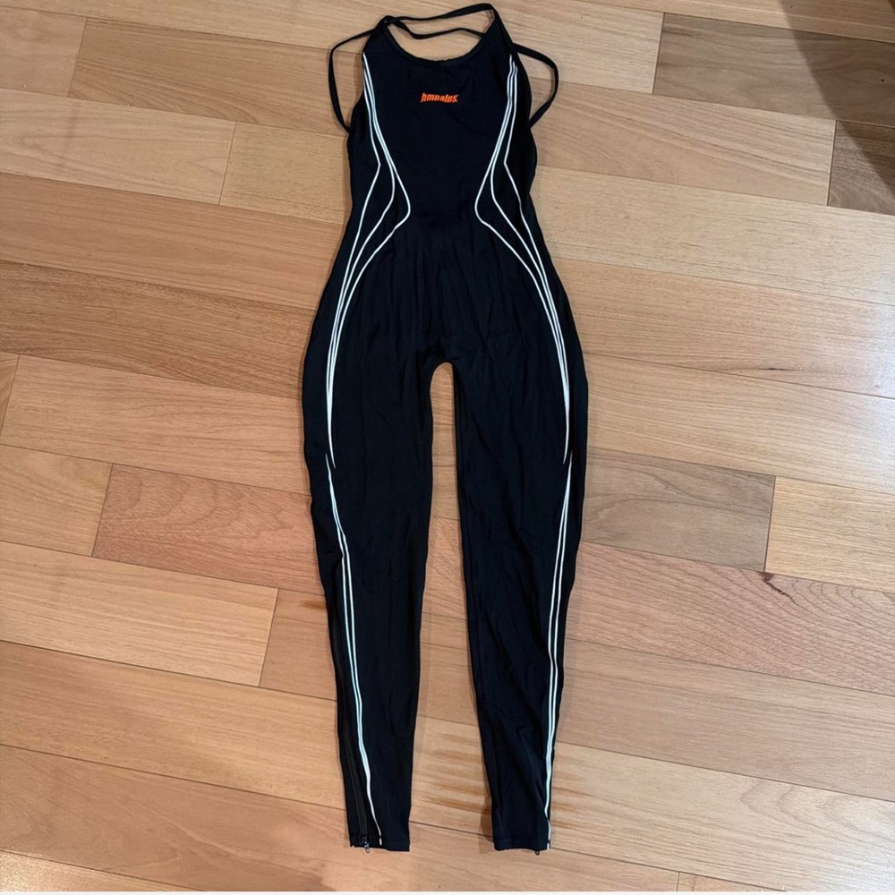 HMNALNS Black Strappy Jumpsuit with White Piping and Orange Logo